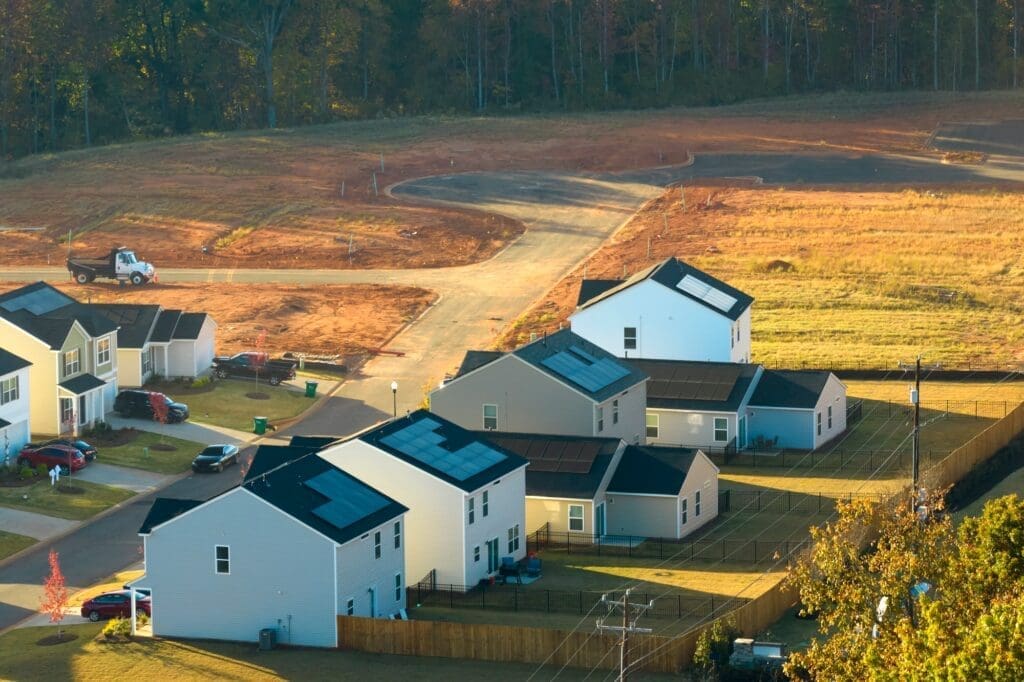 Aerial view of construction site with new tightly packed homes in South Carolina.